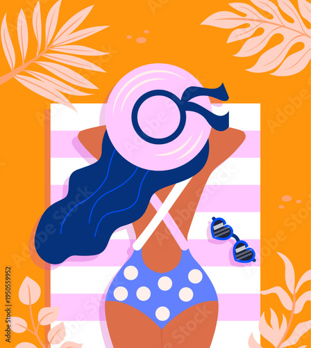 Woman sunbathing on a striped towel with sunglasses