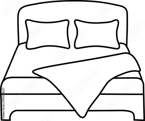 A bed with multiple pillows and a cozy blanket