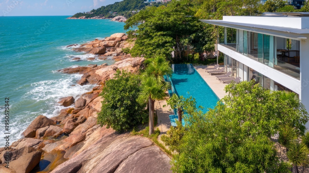 Fototapeta premium Luxurious Villa by the Breezy Sea Under a Bright Day with Stunning Views
