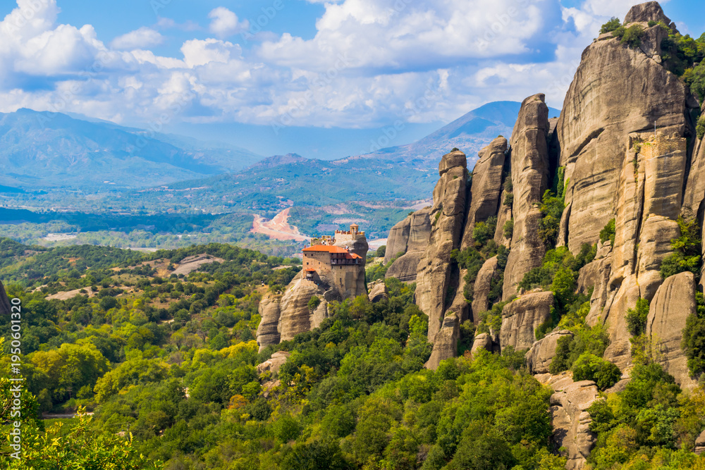 Fototapeta premium Panoramic view of Holy Monastery of St. Nicholas Anapafsas on top of Meteora rocks in Thessaly, Greece
