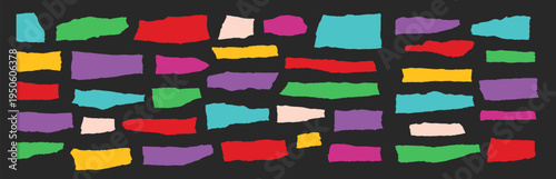 Colorful torn paper strips, ripped collage paper pieces, scrapbook craft decoration elements set on black background