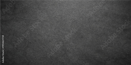 A textured dark gray background evokes a sense of depth and mystery. 