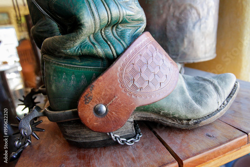 Santa Fe, New Mexico, United States. Vintage cowboy gear. Cowboy spur and leather strap close up western riding gear