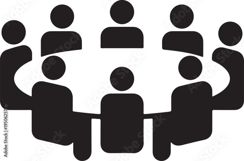 Group of seven individuals sitting together in a collaborative meeting arrangement