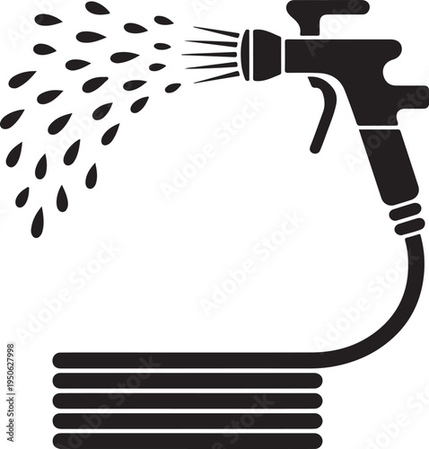 A fire hose nozzle spraying water in a controlled stream