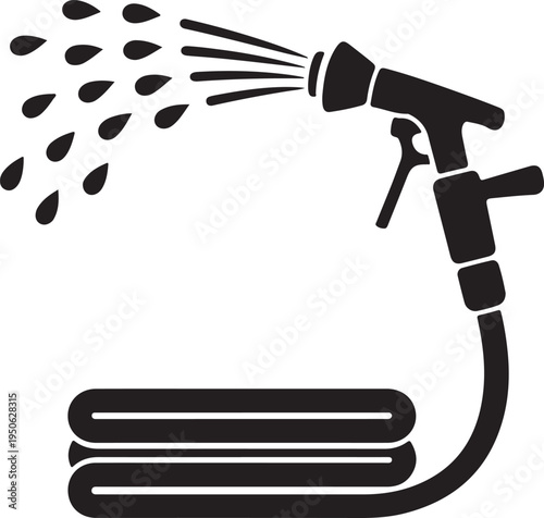 Garden hose spraying water onto a coiled hose on the ground