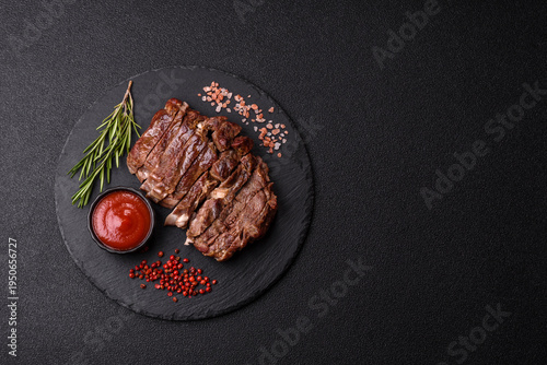 Steak, beef or pork meat grilled or barbecued with salt and spices. Beef steak