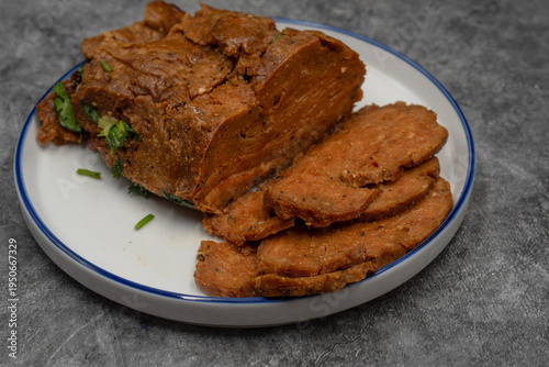 Vegan meat alternative: seitan, wheat gluten protein. Roasted, spicy, flavorful