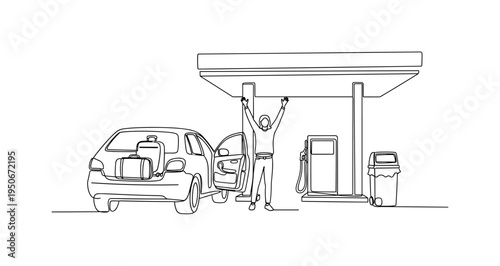 Man with open arms at gas station with car packed for road trip