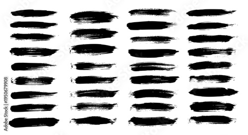 versatile collection of black paint brush strokes and grunge ink textures on white ideal for creative graphic design and artistic elements.