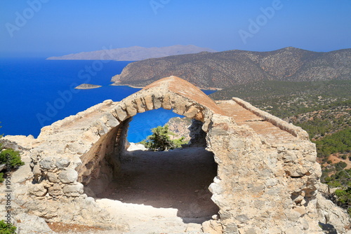 Stone window view of rhodes coastline,The castle of Monolithos, Rhodes, Greece