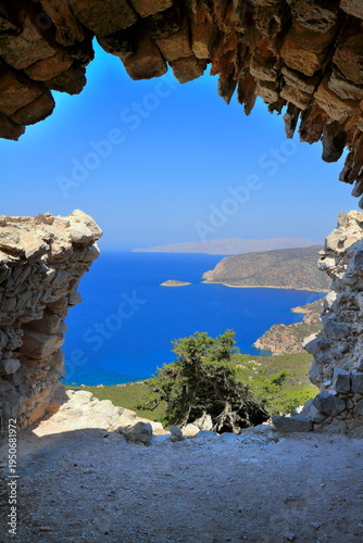 Coastal cave view of turquoise sea,The castle of Monolithos, Rhodes, Greecee