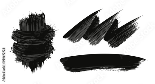 black brush strokes and paint splatters creating abstract artistic elements on white perfect for creative design.