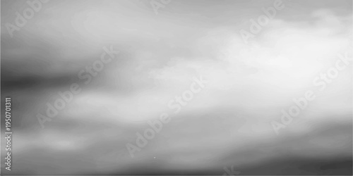 Abstract atmospheric clouds blanket the sky, creating a serene grayscale landscape, evoking a sense of tranquility.