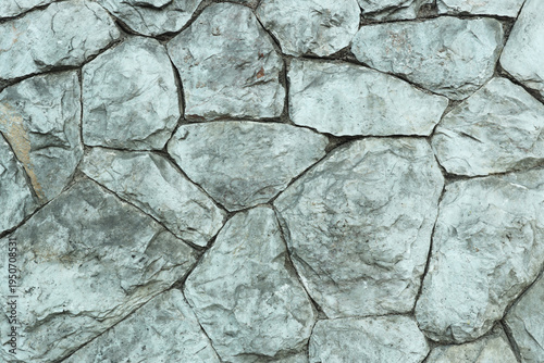 Фотография Gray grey stone wall aged rocks stacked stones architecture