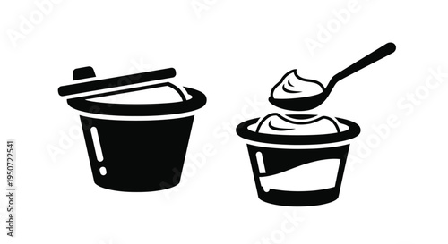 Black and white yogurt containers with spoons a striking silhouette