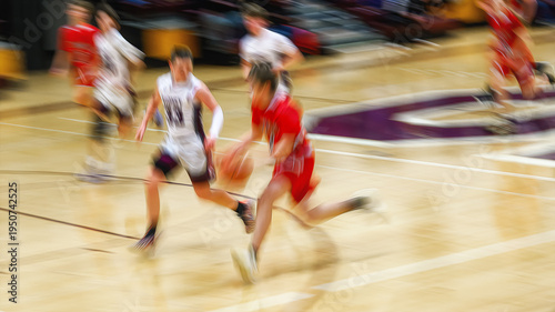 High School Basketball with motion blur showing the speed and movement of the young boys playing the game at Oxford HS in Upstate NY