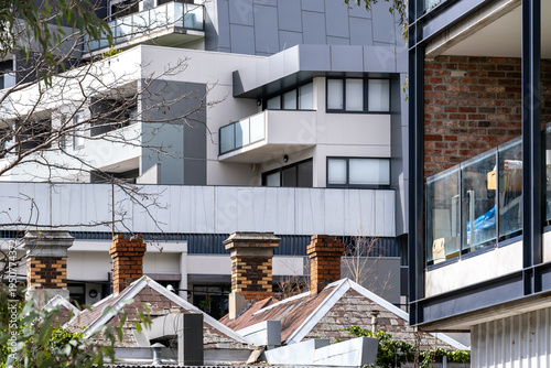 Tableau sur toile Mixed housing in Brunswick, Melbourne, Australia, showing contrast between modern apartment buildings and older heritage residential homes