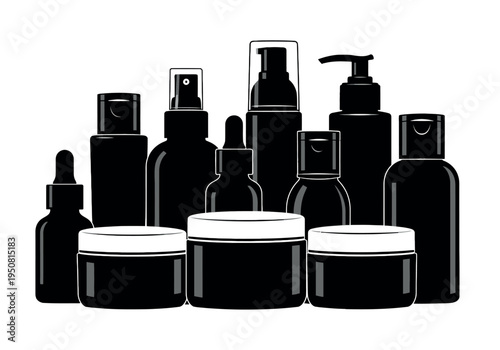 Assorted black skincare and beauty product bottles arranged in a group
