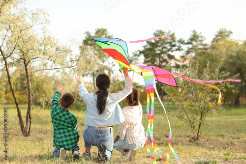 Mother and her children wit...