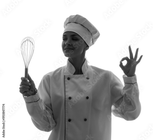 Silhouette of female chef with whisk showing OK on white background