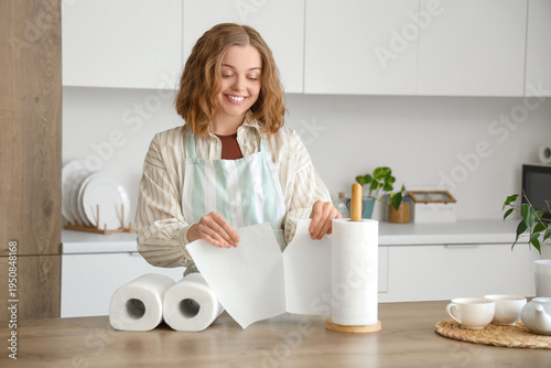 Young woman with rolls of p...