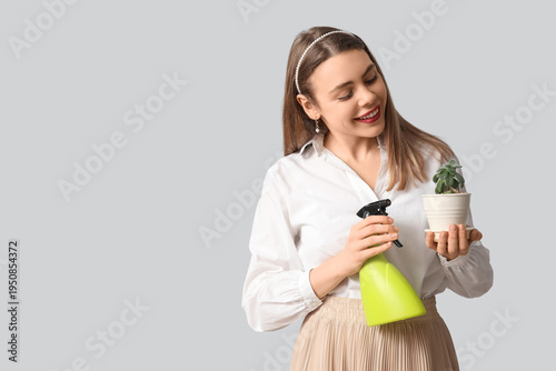 Beautiful young woman with ...