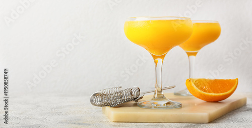 Glasses of orange margarita...