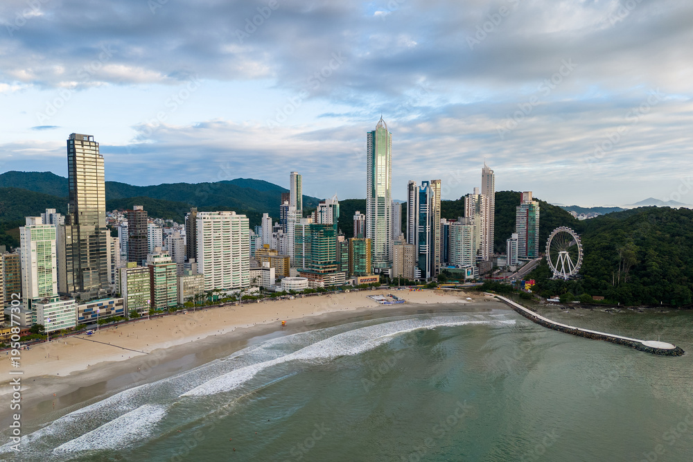 Fototapeta premium Coast of Balneario Camboriu City With Tall Skyscrapers and Dramatic Sky