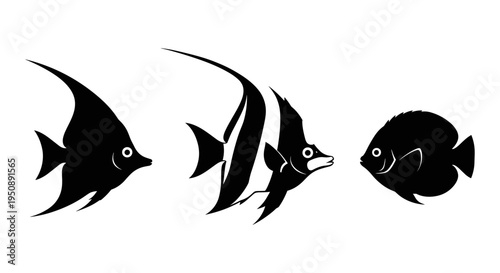 Collection of three diverse silhouetted tropical fish including a moorish idol and angelfish swimming in abstract