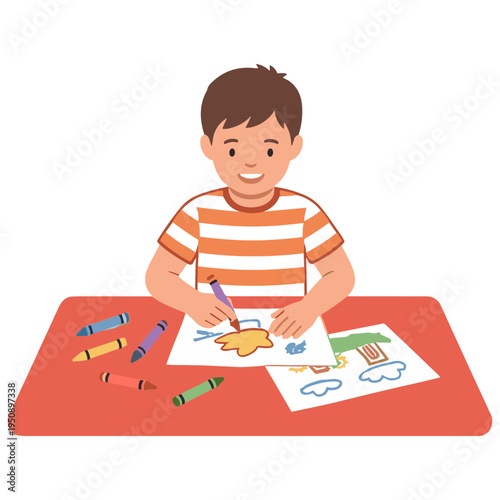 A young boy sitting at a table happily drawing with colorful crayons on paper.