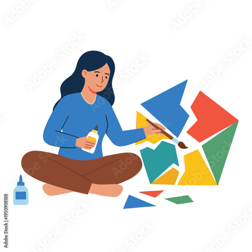 A woman sitting on the floor is painting a puzzle with colorful pieces.