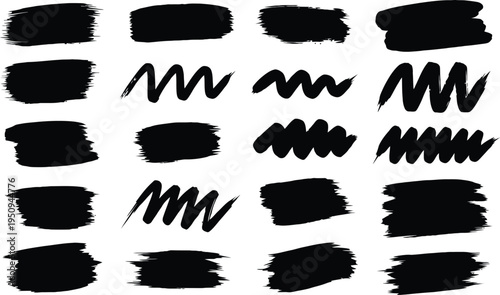 Collection of black brush strokes and scribbles on white background