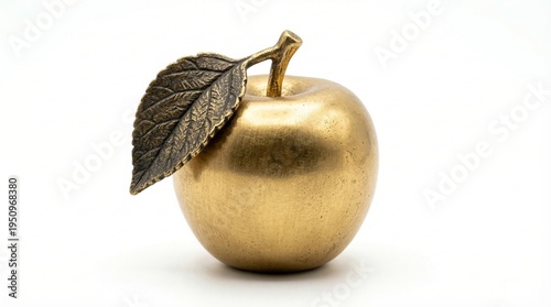 Luxury gold metallic apple with bronze leaf