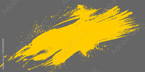 Abstract yellow paint brush stroke in the artistic background.