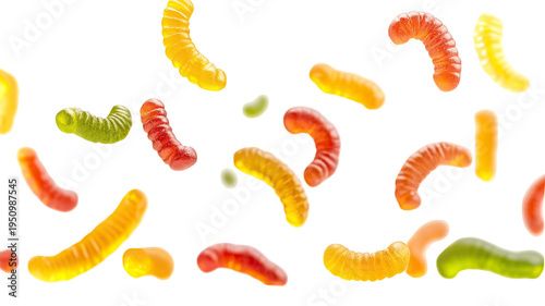 A colorful assortment of gummy worms suspended against a black background on Transparent Background