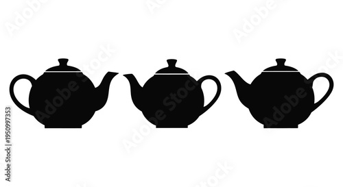 Three black teapots arranged in a row a striking silhouette