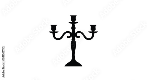 Simple black silhouette of a five branched candelabra on white