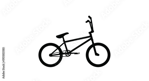 Silhouette of a bmx bike against a stark white background