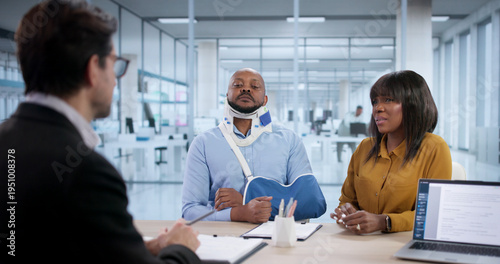 Canvas Print In A Busy Office, A Lawyer Helps An Injured Worker File Disability Claims