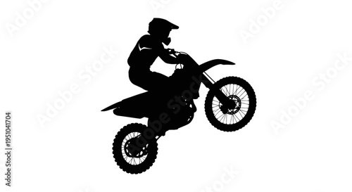 Motocross rider silhouette doing a wheelie on a dirt bike, isolated on white background
