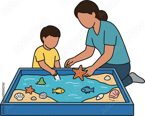 Woman and child play with starfish in sandbox