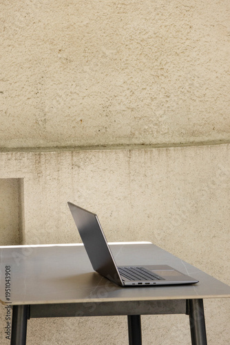 Laptop on an Outdoor Dining Table