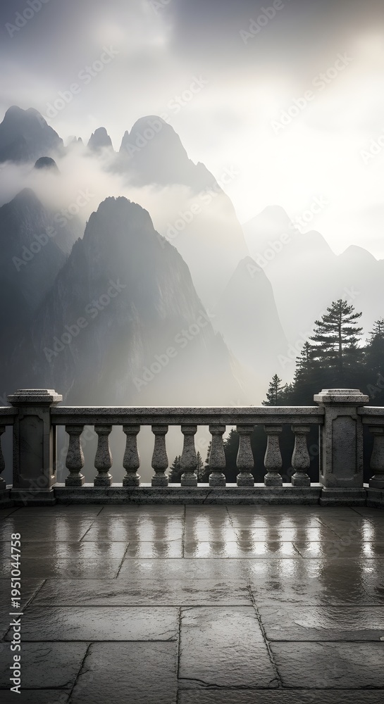 Obraz premium Stone balcony overlooking misty mountain peaks in a serene landscape