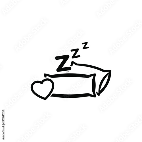 A sleeping pillow with a heart and zzz symbol on it