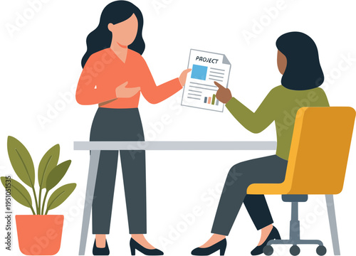 Two women discuss project at office desk with charts and plant nearby.