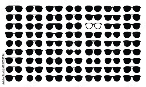 A large collection of various black silhouette sunglasses and eyeglass frames on a white background