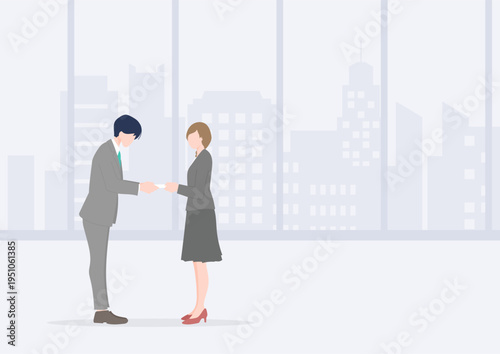 Businessman and Businesswoman Exchanging Business Cards in a Modern Office with Large Windows