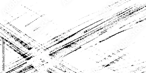 Black diagonal grunge tire tracks and scratched ink texture on white background provides a gritty, weathered aesthetic.