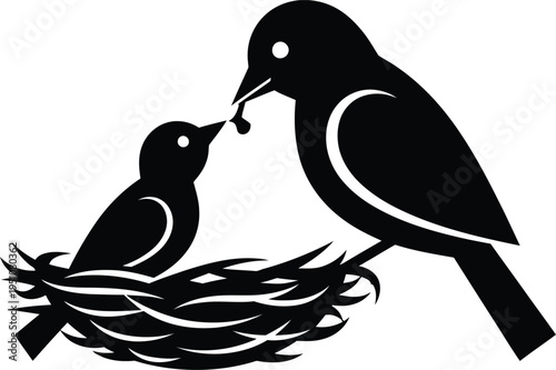 Happy mother's day silhouette of mother bird feeding baby bird in nest